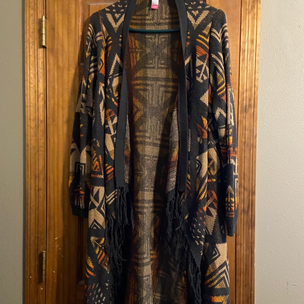 Long knit sweater.